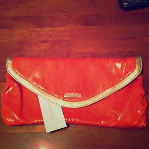 Kenneth Cole reaction clutch