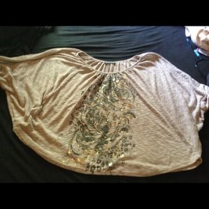 Flowing off the shoulder tan gold design shirt