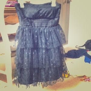 An elegant yet fun black cocktail dress.