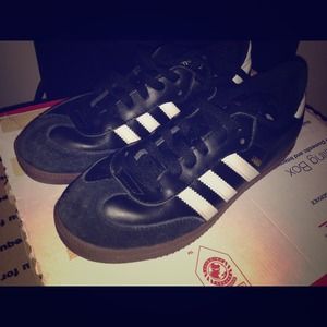 Black and white Adidas with the gum sole.