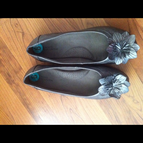 Grey flats with flower