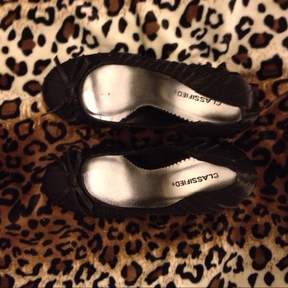 Satin bow heels. Used once.