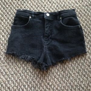 Distressed black denim high-waisted shorts