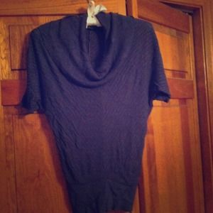 Purple cowl neck sweater.