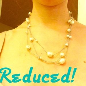 Long beads and faux pearl necklace