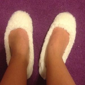 Very fuzzy white slippers!