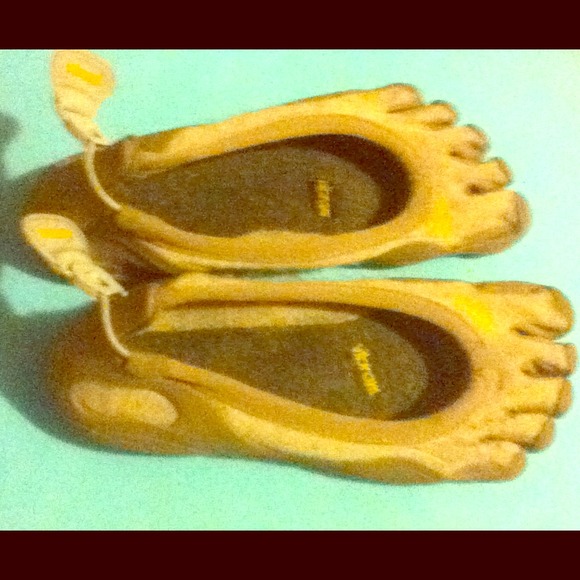 Beige/Brown Vibram shoes. Price negotiable