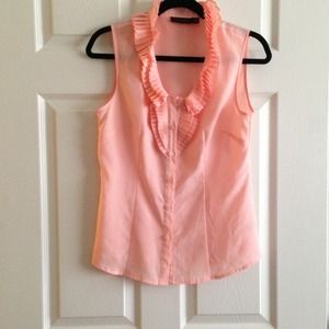 Sleeveless blouse. Light coral color.