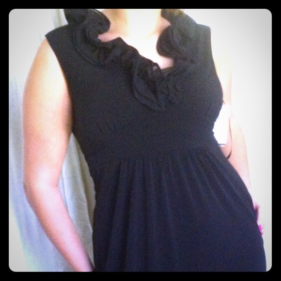 Black cocktail dress with ruffled neckline