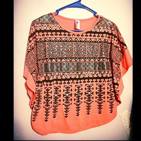 Orange blouse with black tribal print