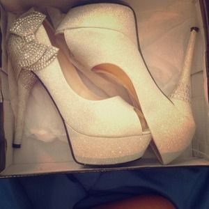 Silver glitter heels/ open toe with side bow.