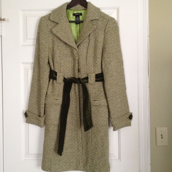 Never worn and not your usual dark winter coat!