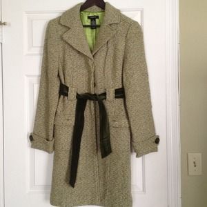 Never worn and not your usual dark winter coat!