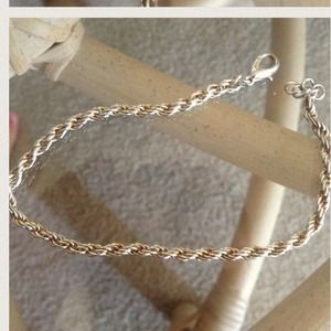 Silver and gold tone bracelet
