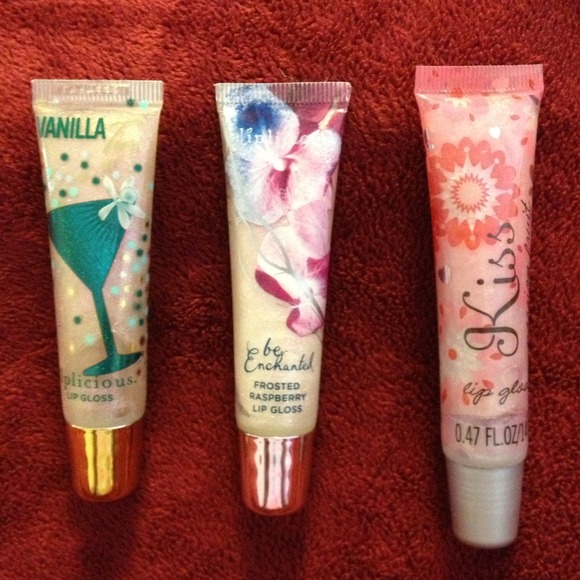 3 shimmer lipgloss tubes. 2 are Bath & Body Works.