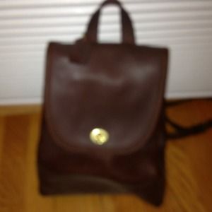 Authentic brown leather coach backpack.
