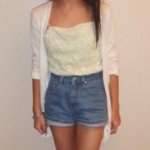 Green tank with floral design.