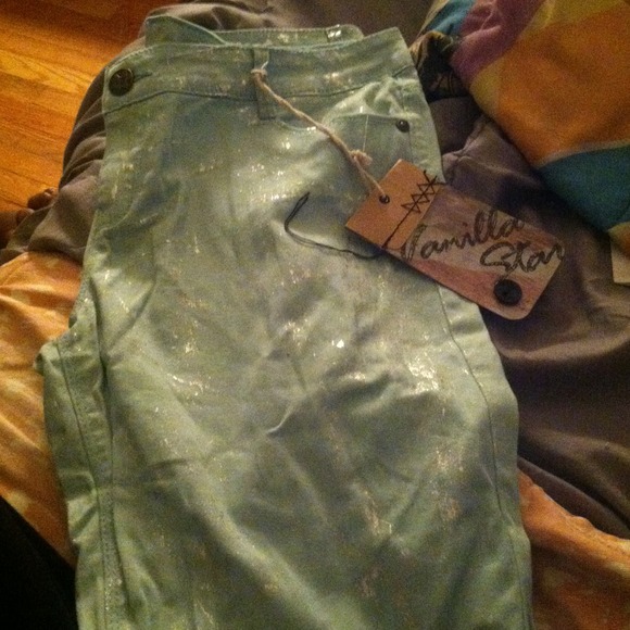 Sky blue jeans with silver streakinga