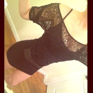 Black knitted dress with attached front belt