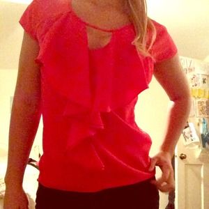 Red ruffled top with clevage