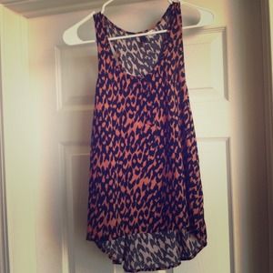 Coral and black tank with leopard like design.