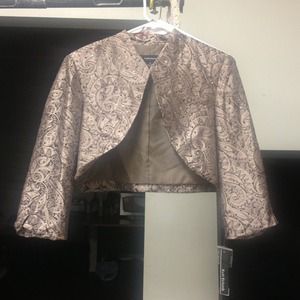 Beautiful sparkling blazer. Very cute and cheek.