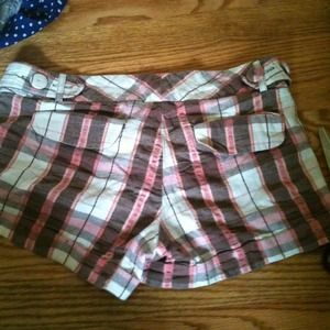 Patterned shorts in brown pink and white.
