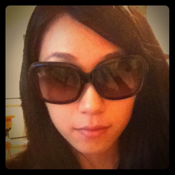 Authentic Chanel sunglasses with side bow logo