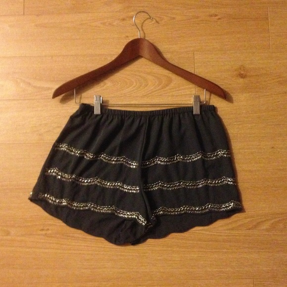 High waisted dark grey shorts with beaded lines.
