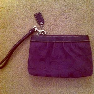 authentic COACH wristlet. purple