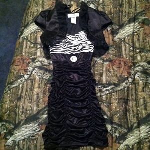 Zebra print dress & black cove up.