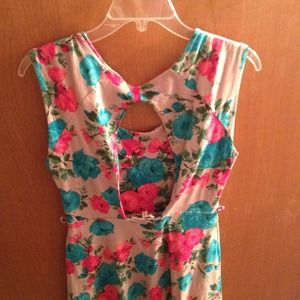 Floral dress with cutout back.