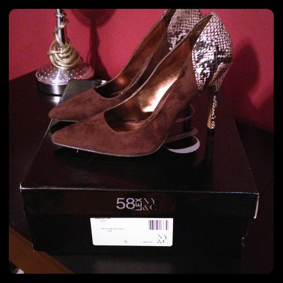 Brown snakeskin pumps