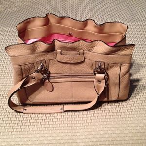 Authentic Coach sand leather handbag, pink lining.