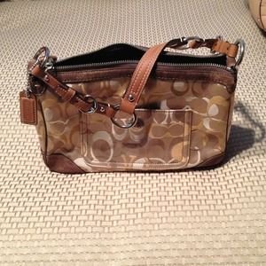 Authentic Coach signature handbag in multi/suede.