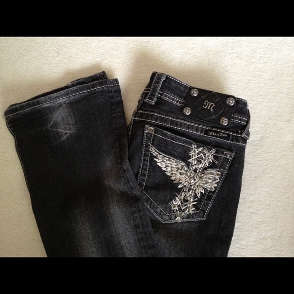 On hold. Miss Me distressed black jeans. Size 28