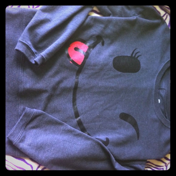 Wink face sweater