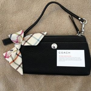 Black pebbled leather wristlet with bow, new
