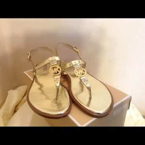 MK gold sandals