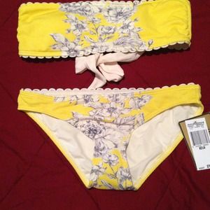 Juicy couture bathing suit top is sz L bottom is M