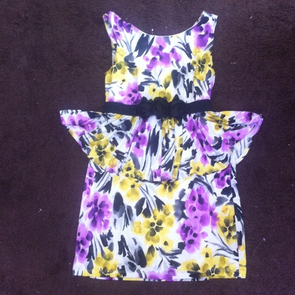 Floral firm fitting peplume dress