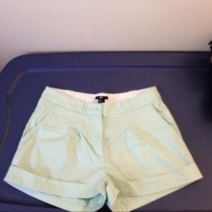 Mint colored shorts.