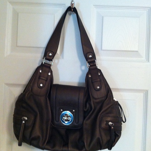 Bronze handbag and brown wallet.