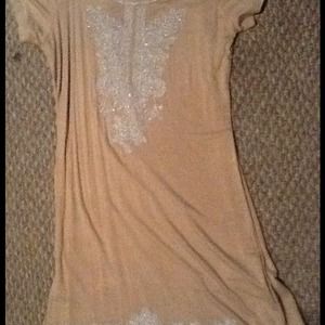 Beige with white design on top and bottom of dress