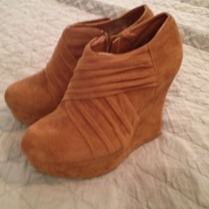 Brown wedge booties