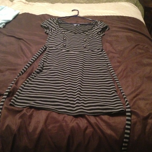 Black and gray striped dress with tie in the back.