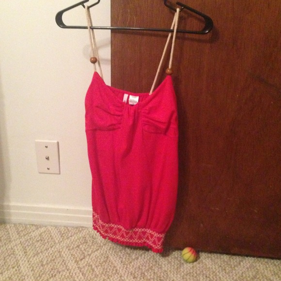 Cute red top, never worn.