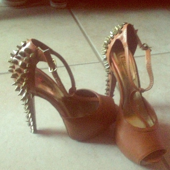 Light brown spikes heels