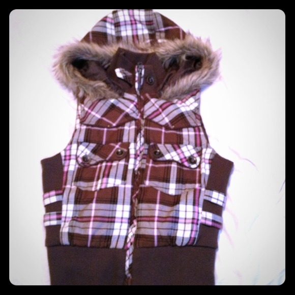 Vest with a detachable hoody.