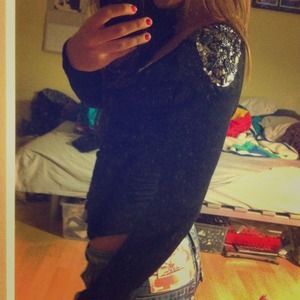 Long sleeved shirt with bejeweled shoulder